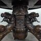 Renaissance-style gueridon with dragon heads in oak