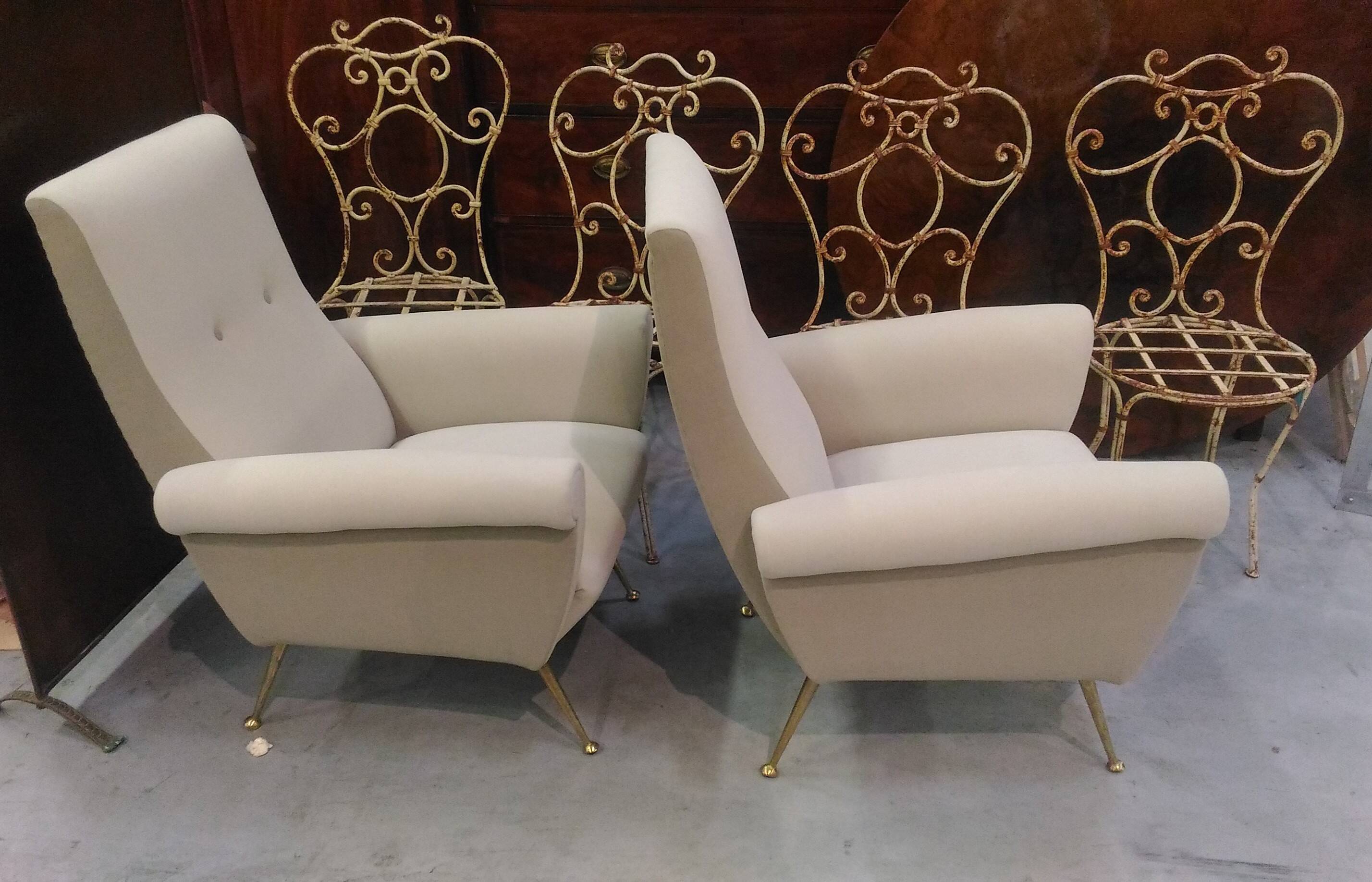 Pair of low armchairs in brass and textile. Italy 1950s