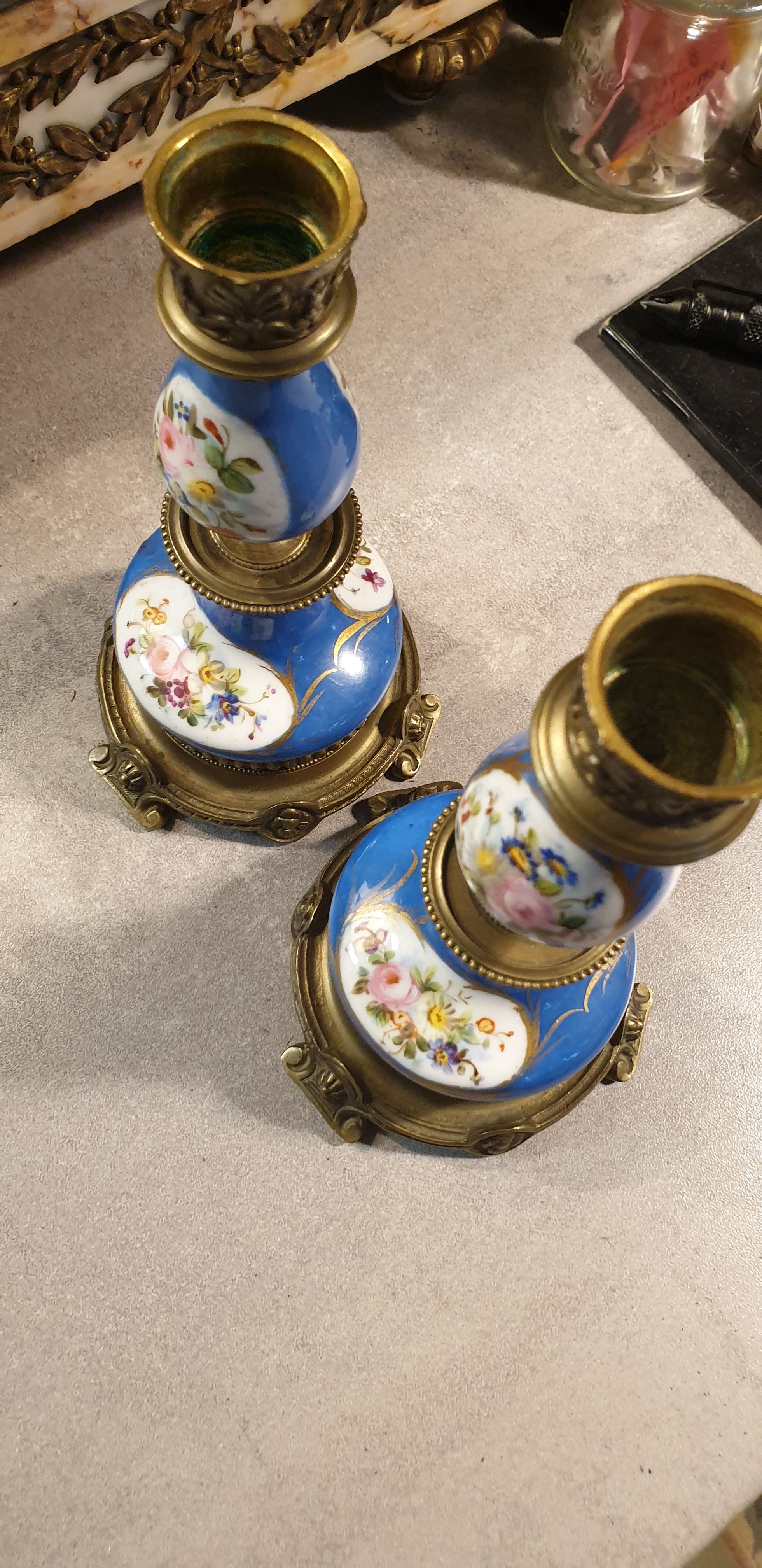 Pair of xixth candle holders, in bronze and enamelled porcelain