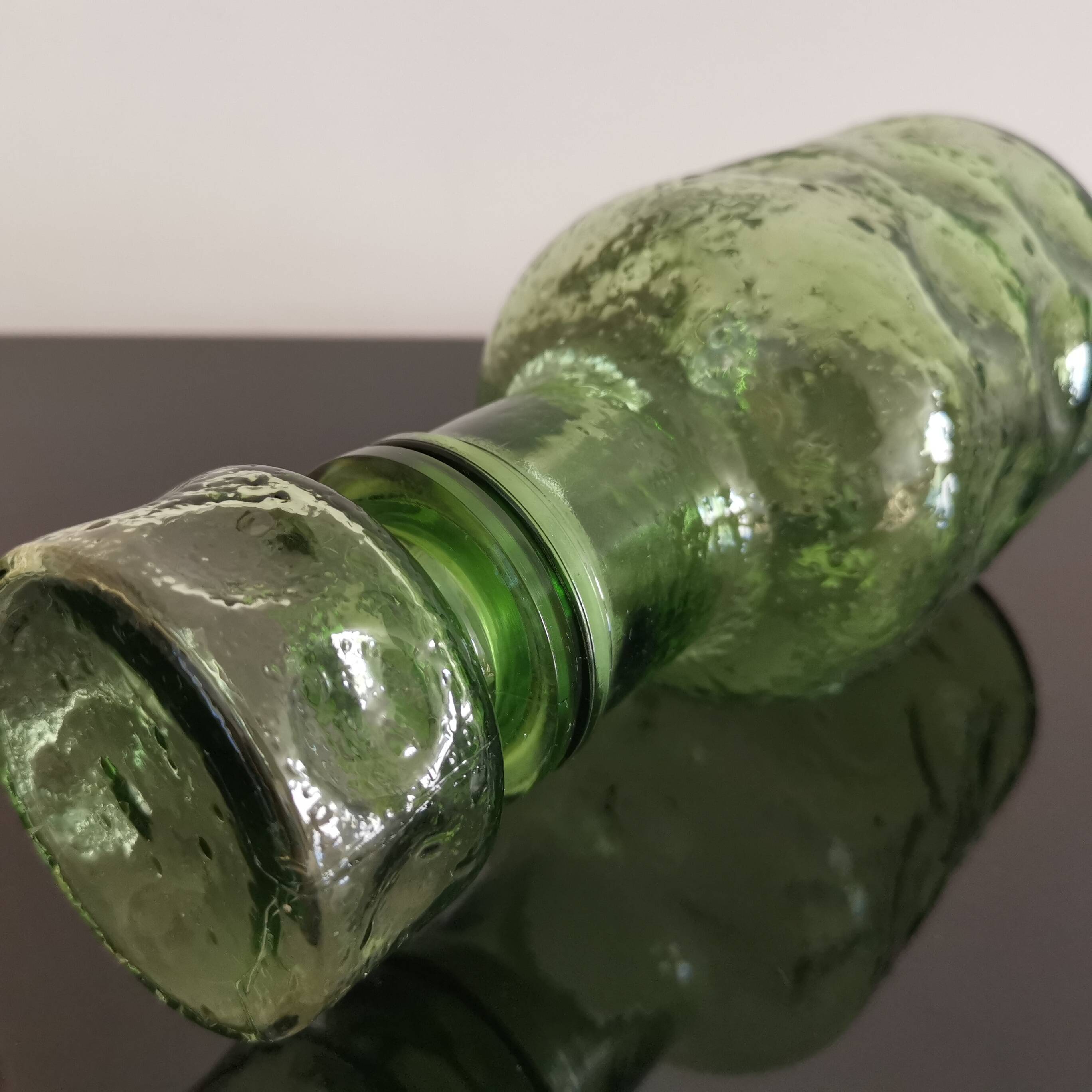 Old green glass carafe