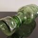 Old green glass carafe