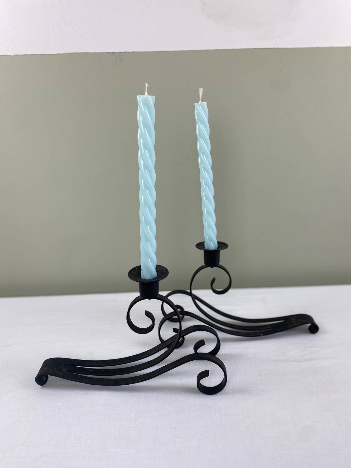 Pair of wrought iron candlesticks