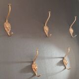Set of 5 antique "Lion Head" coat hooks.