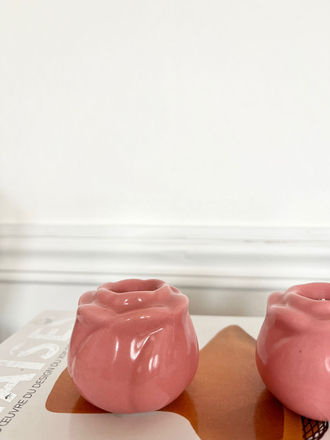 Pair of pink ceramic candle holders