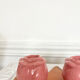 Pair of pink ceramic candle holders