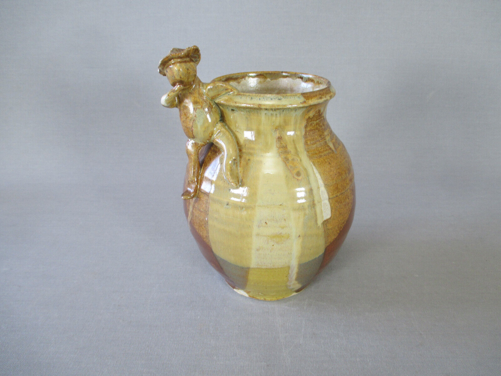 Signed anthropomorphic sandstone vase to be identified