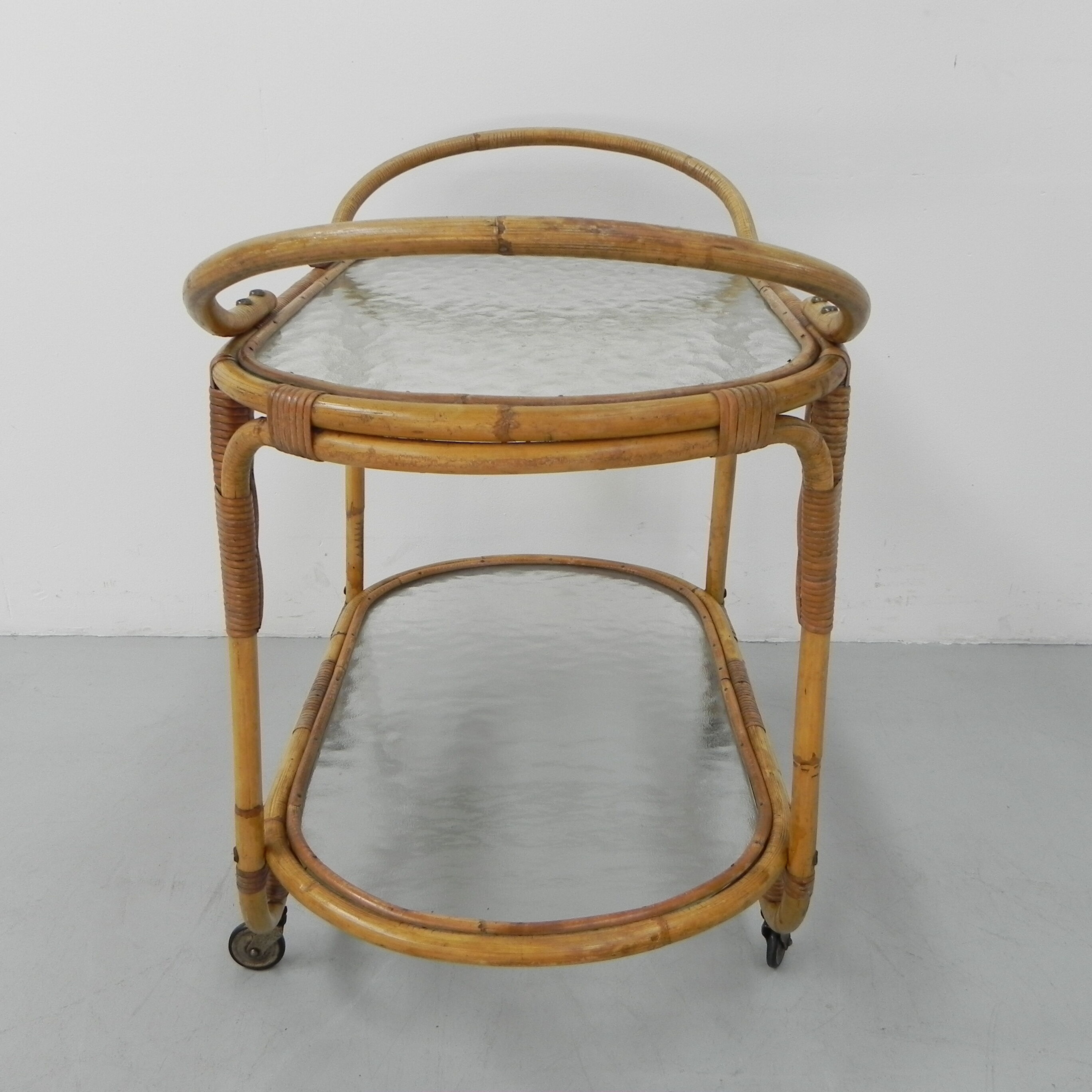 Bamboo, rattan serving trolley on castors