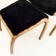 Fauteuil vintage GA Berg « Torparen », chêne, peau de mouton noire, ottoman, années 1960