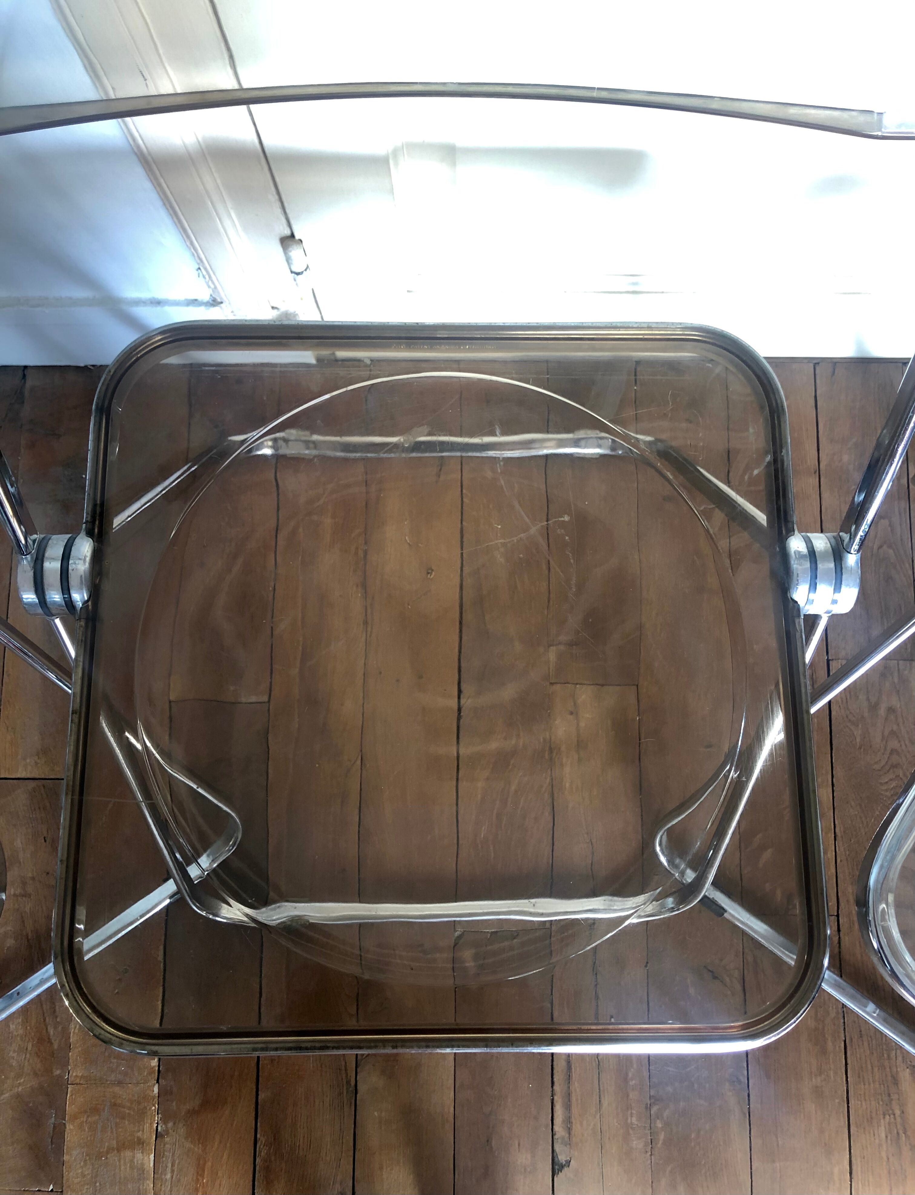 Three folding chairs Plia, Giancarlo Piretti for Castelli