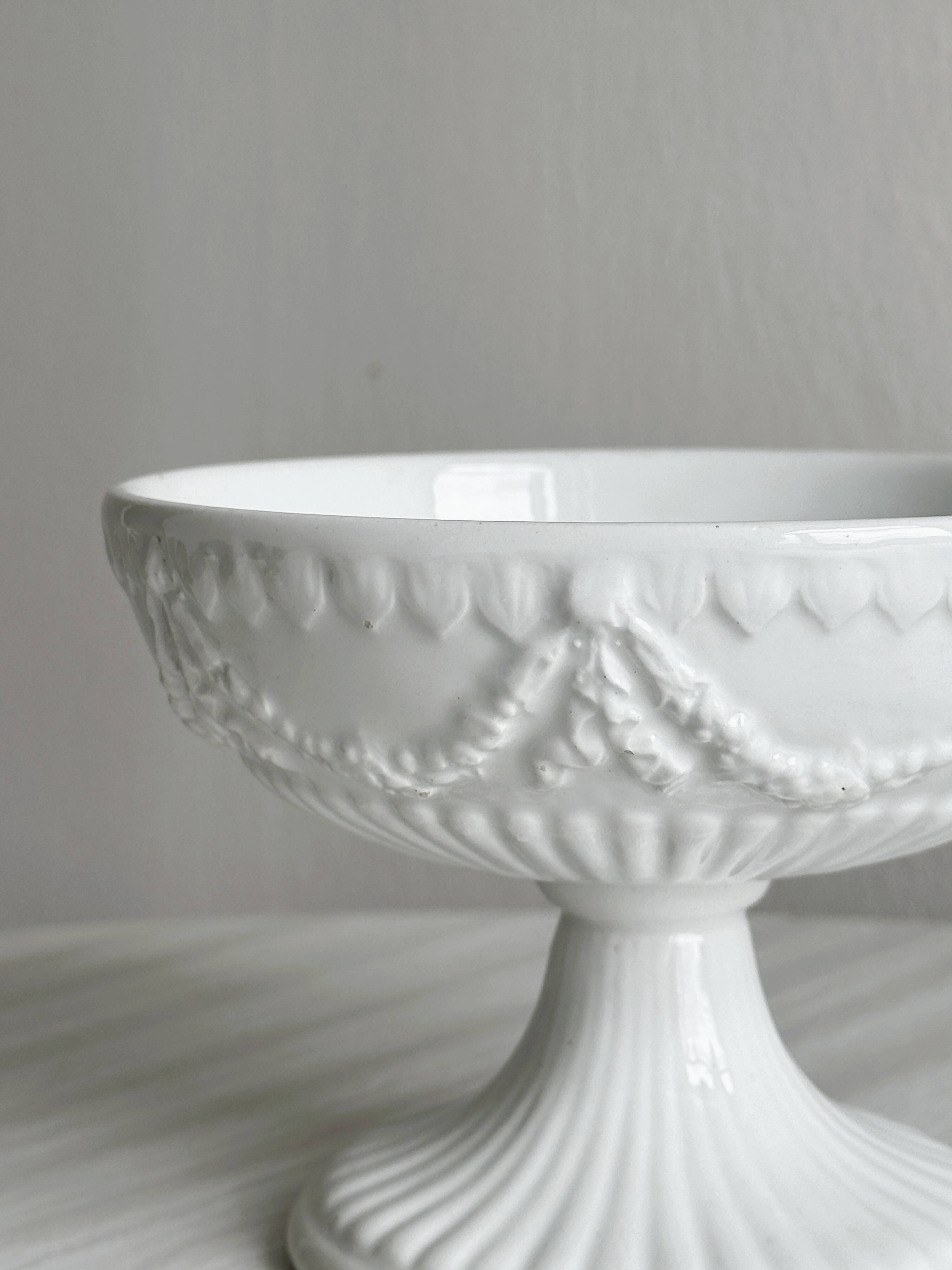 Decorated white porcelain cup