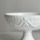 Decorated white porcelain cup