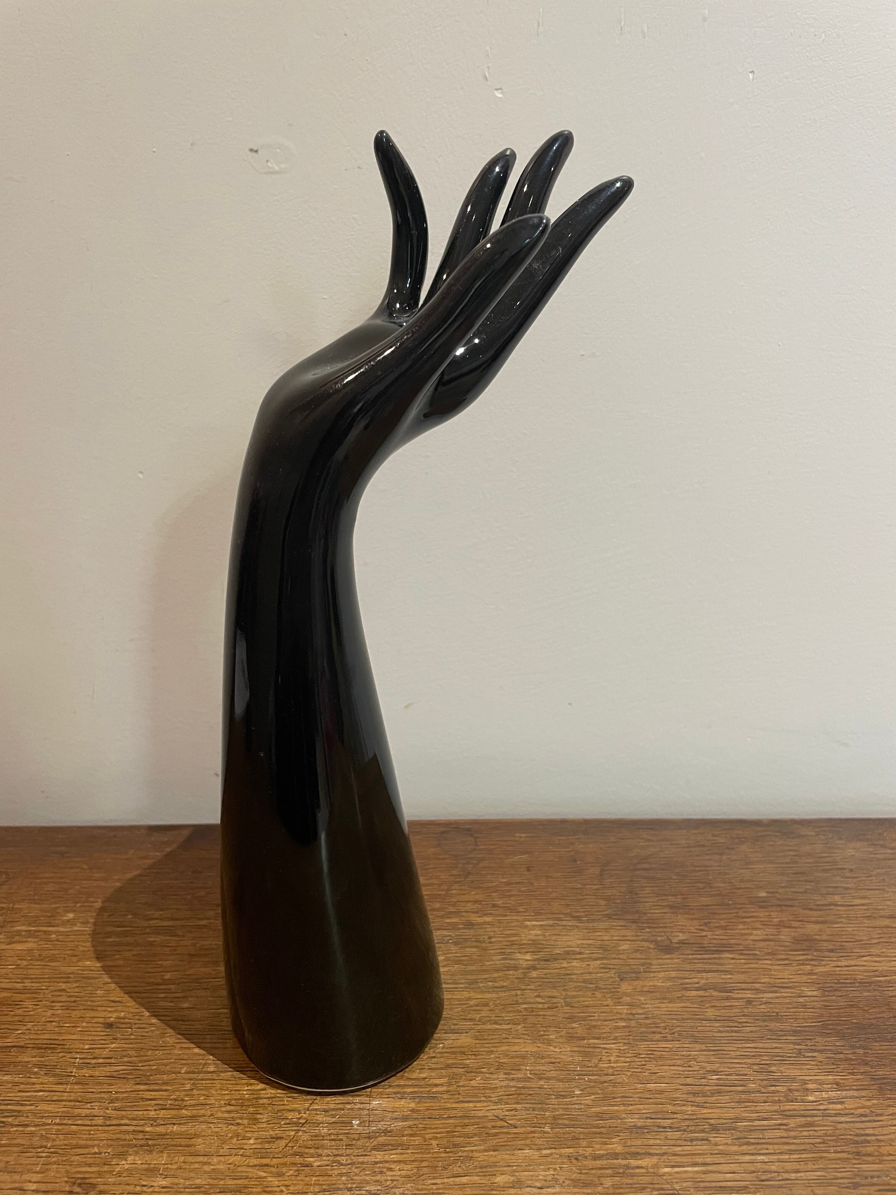 Black ceramic hand sculpture