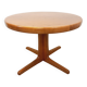 Vintage round dining table in Scandinavian style from the 60s and 70s in elm.