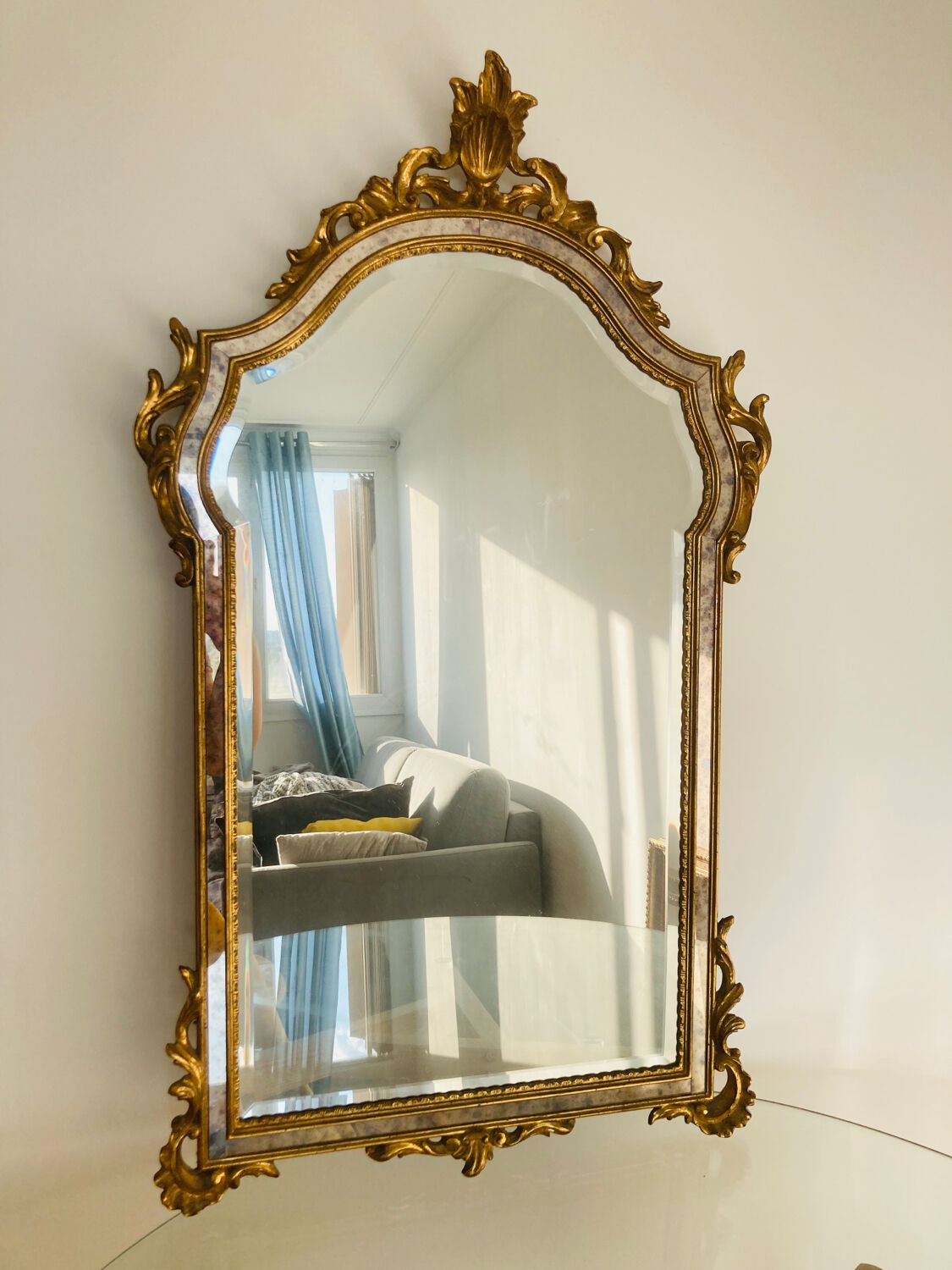 Large golden mirror parecloses