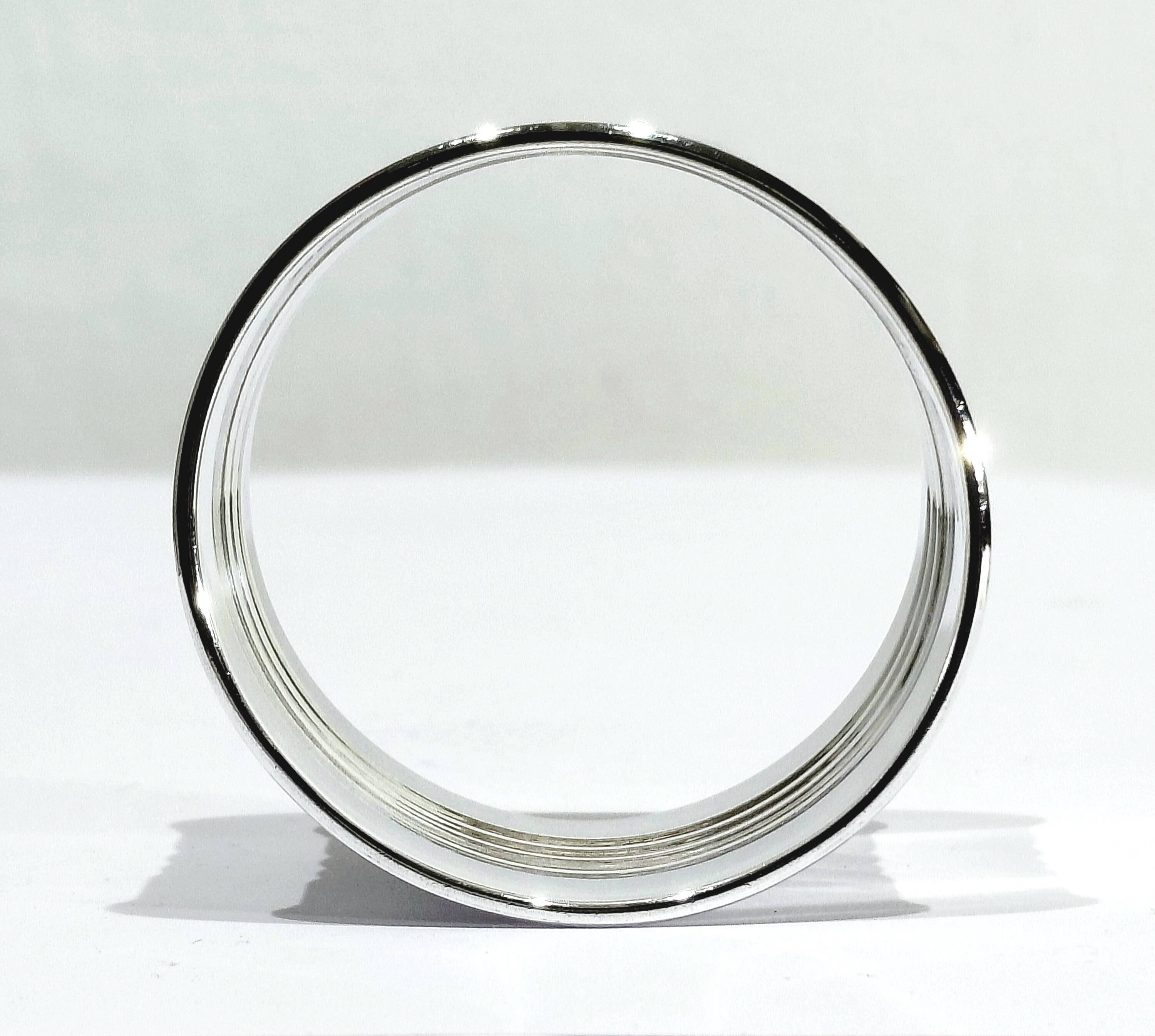 Round Silver Napkin Ring with Striped Decoration