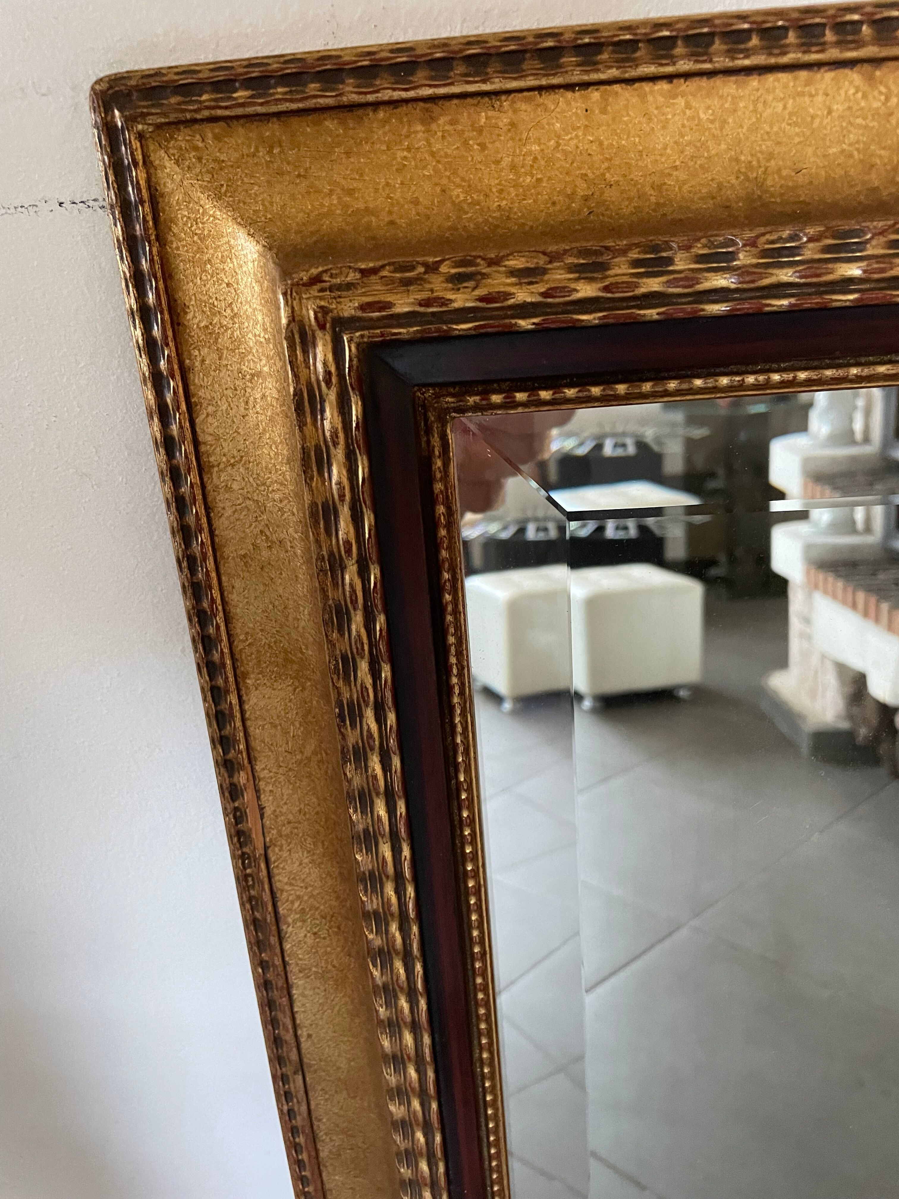 Mirror gilded frame black net and beveled ice used