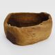 Old wooden farm water trough. Centerpiece, floral decoration. 1950