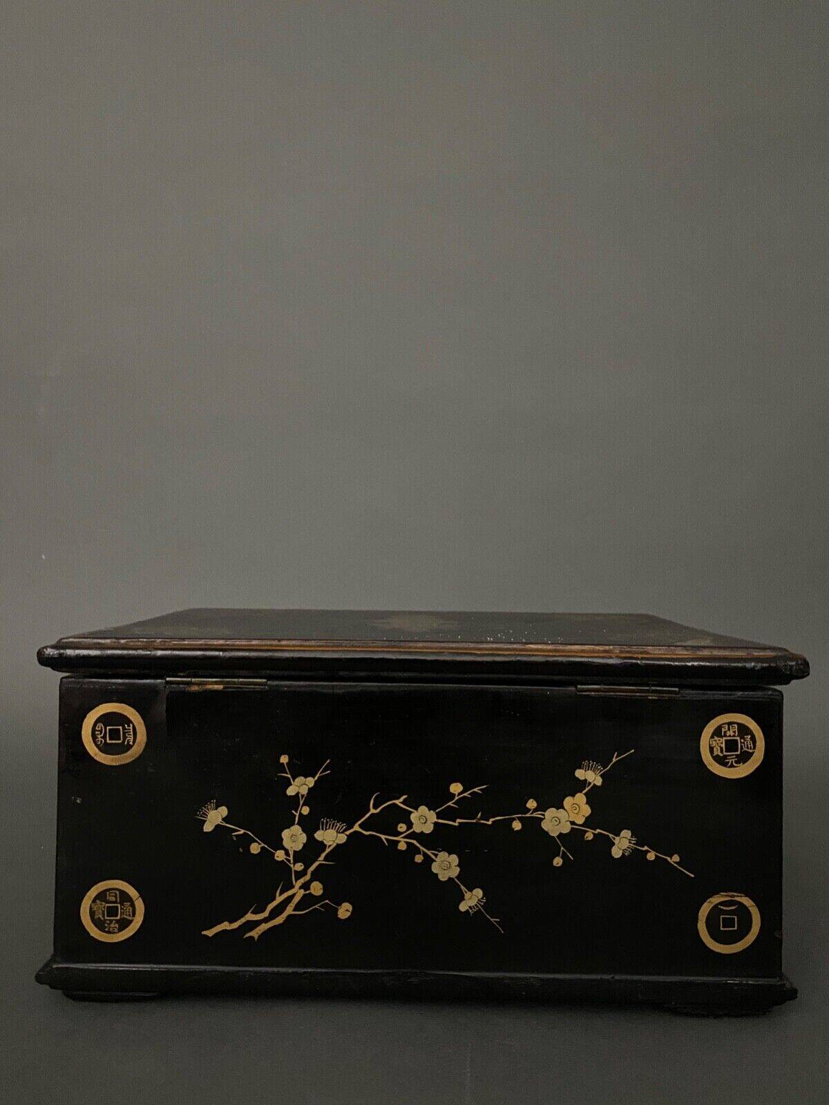 20th century Indian wooden box black lacquer decorated with animals with gold highlights