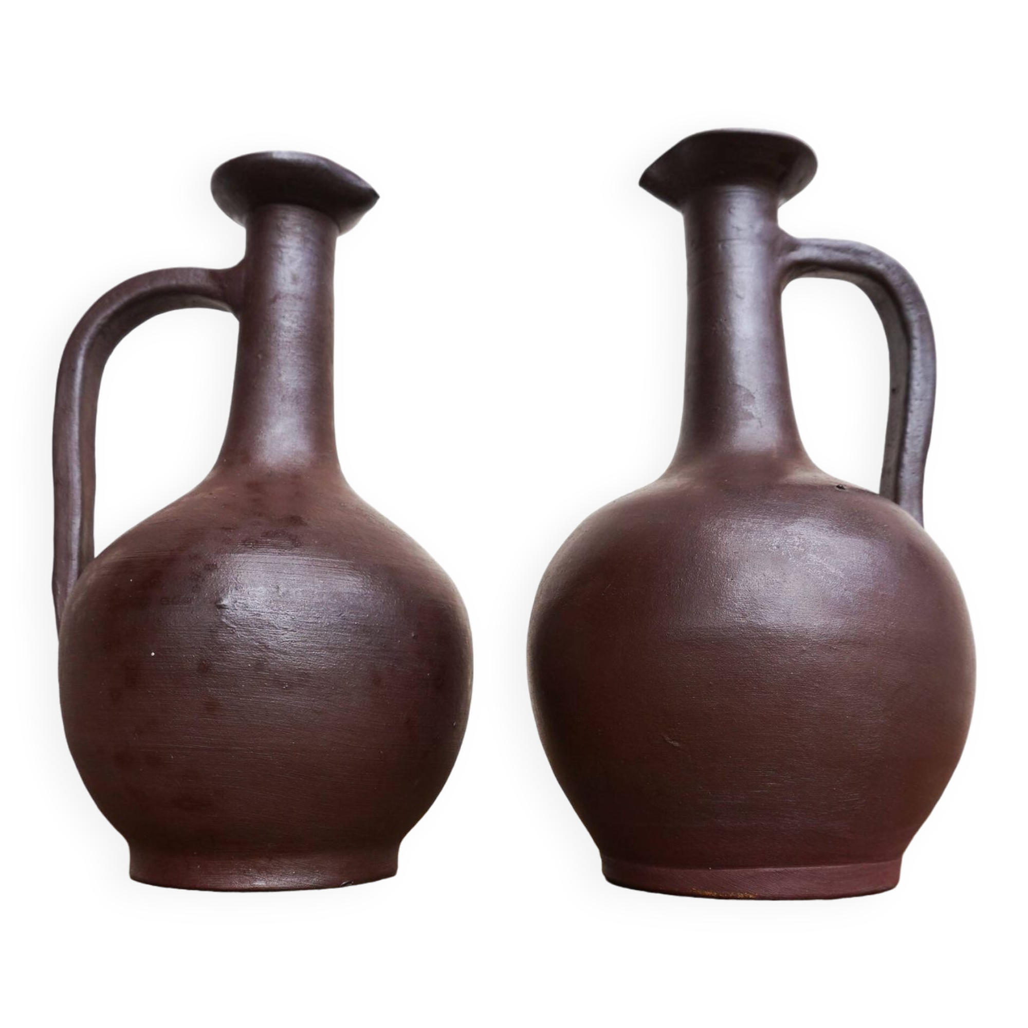 pair of terracotta bottles or carafes