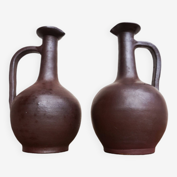 pair of terracotta bottles or carafes