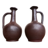 pair of terracotta bottles or carafes