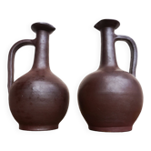 pair of terracotta bottles or carafes