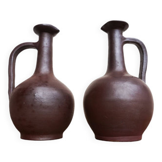 pair of terracotta bottles or carafes