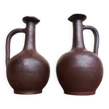 pair of terracotta bottles or carafes
