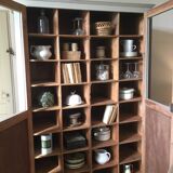 Antique Parisian wardrobe with interior compartments.