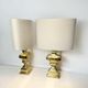 Pair of Italian brass table lamps from the 1950s.
