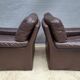 Pair of chocolate leather lounge chairs