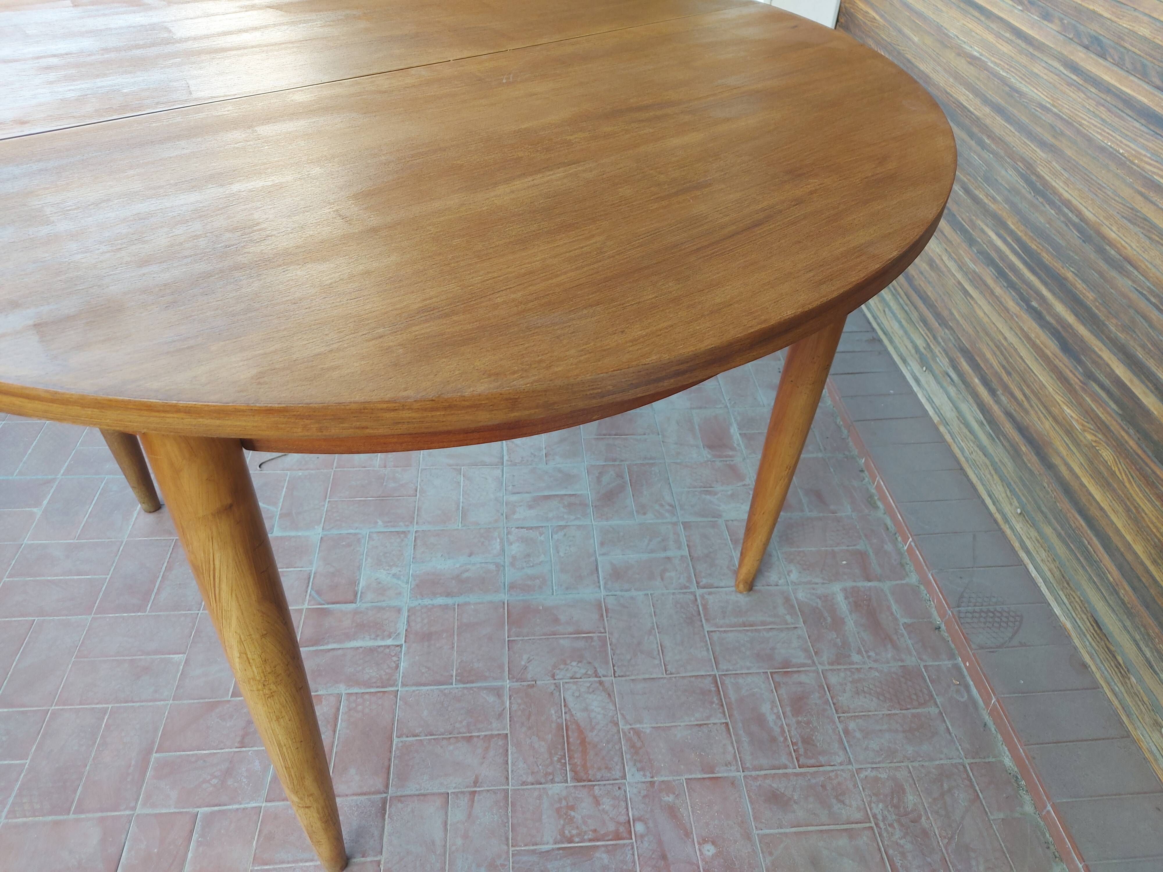 Scandinavian design teak table with extension cord