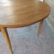 Scandinavian design teak table with extension cord