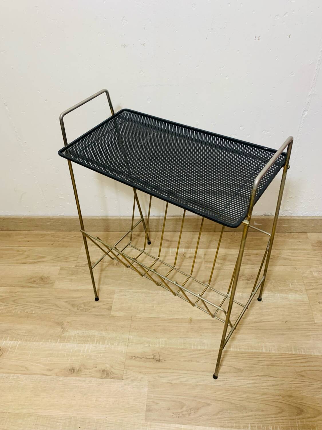 Perforated metal magazine rack