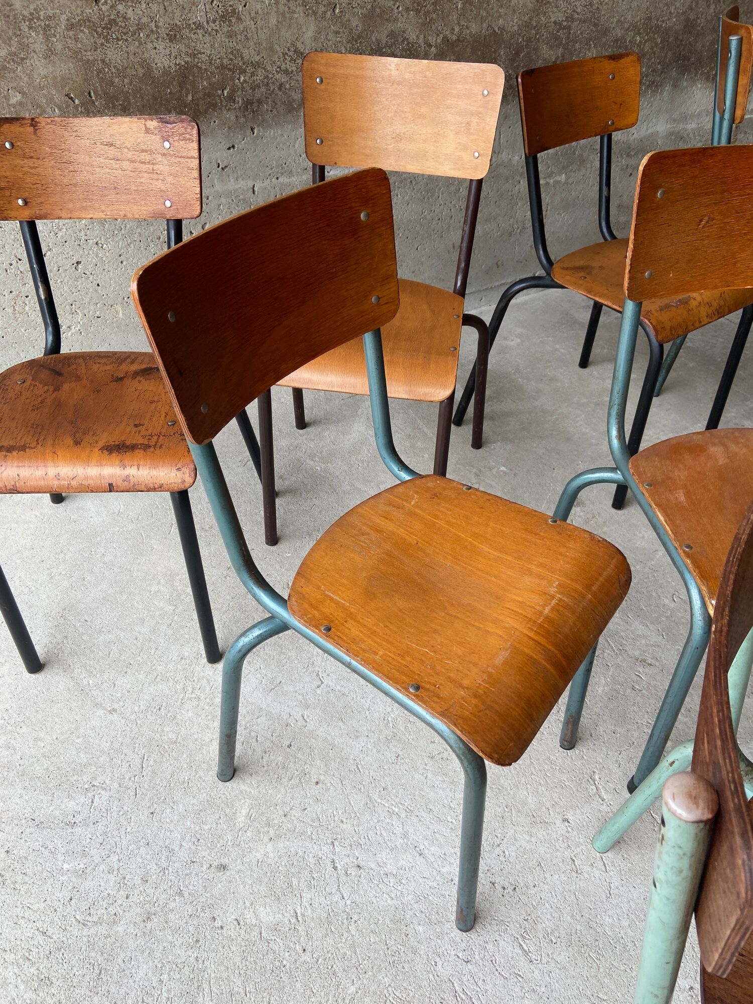 Set of 10 vintage mismatched industrial chairs mullca