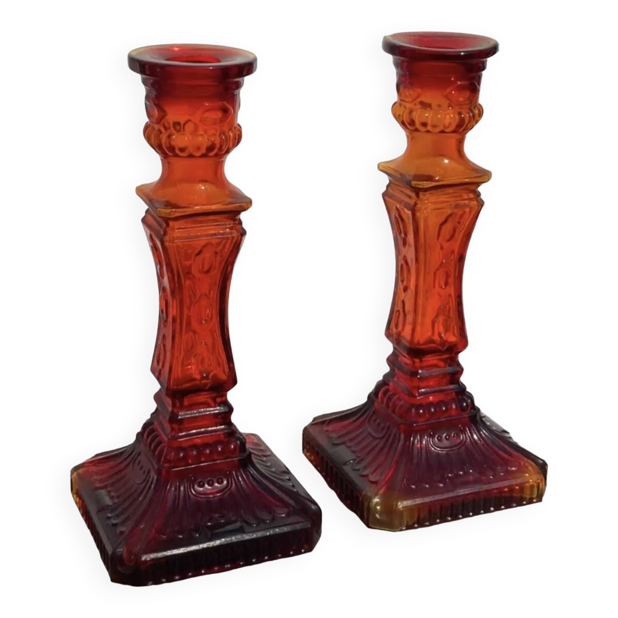 Pair of amber glass candlesticks