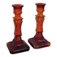 Pair of amber glass candlesticks