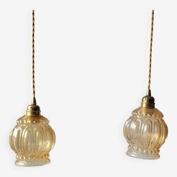 Duo of amber molded glass pendant lights