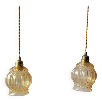 Duo of amber molded glass pendant lights