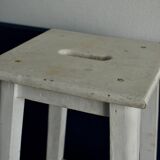 Old white wooden handle stool