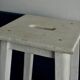 Old white wooden handle stool