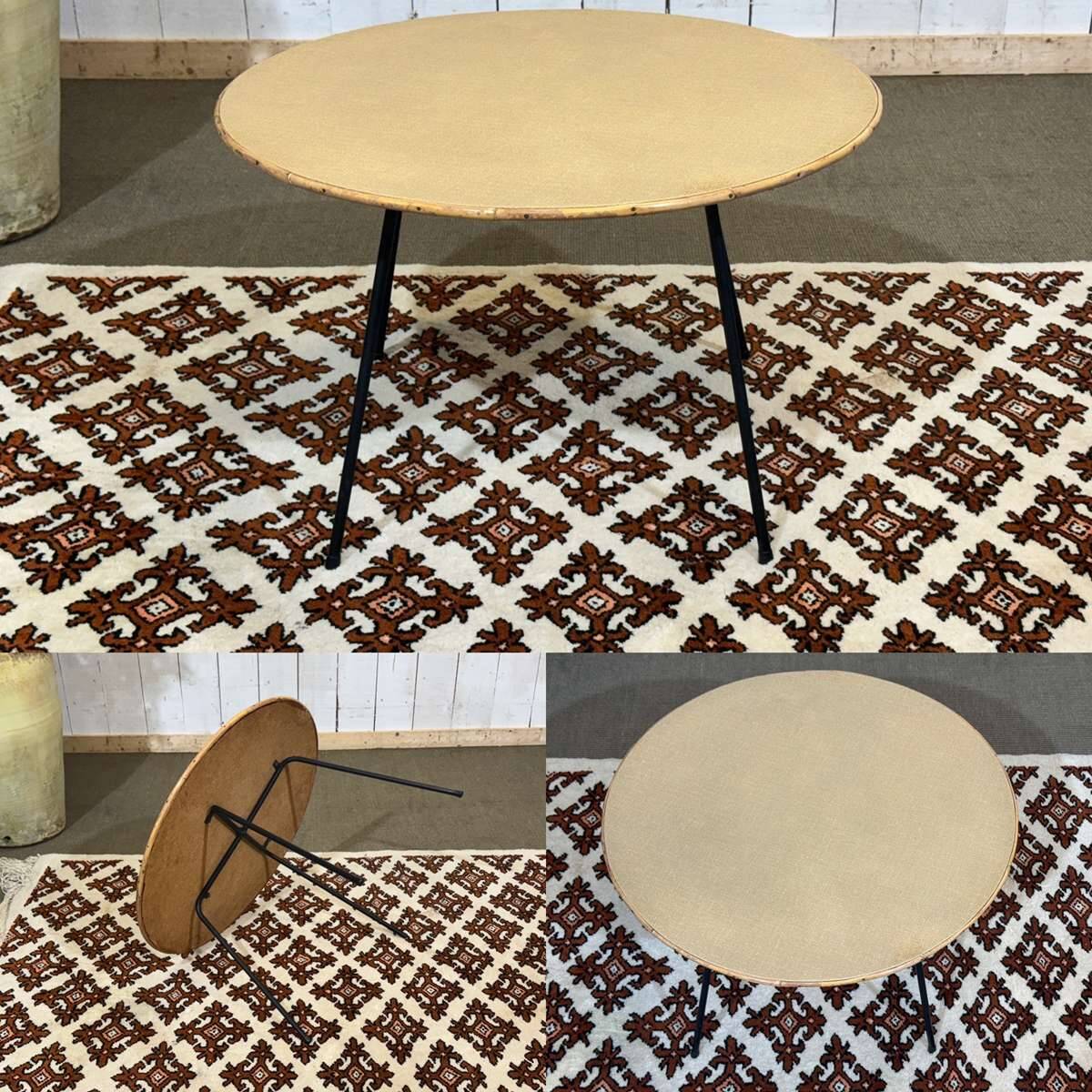 1970s guéridon in rattan with a metal base.