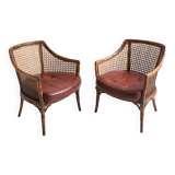 Pair of armchairs in walnut and antique cane, 19th century