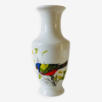 Small white porcelain vase with pretty bird