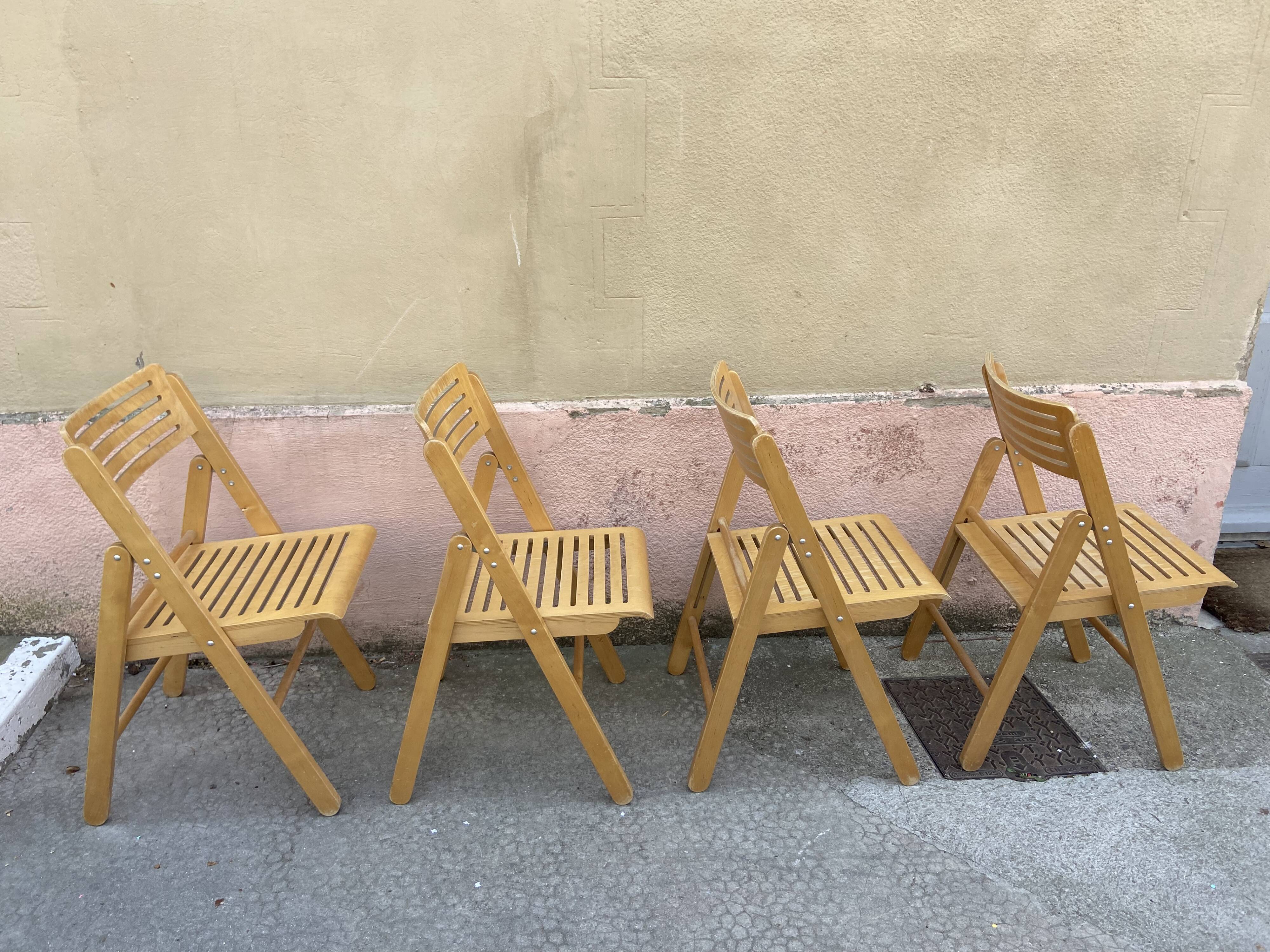 Series of 4 Scandinavian folding chairs 70s
