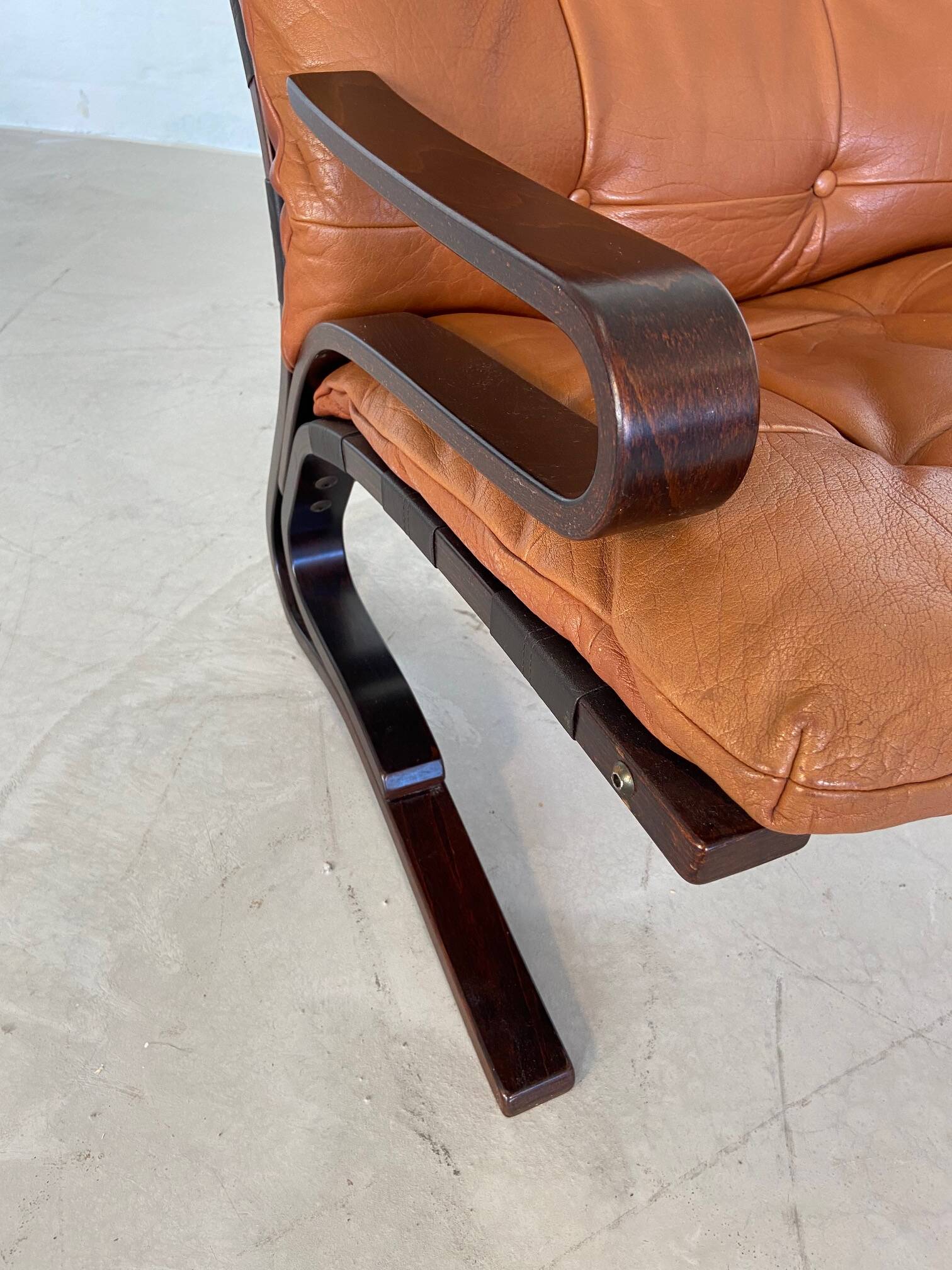 Vintage mid century scandinavian (oddvin rykken) cognac leather chair 1960s