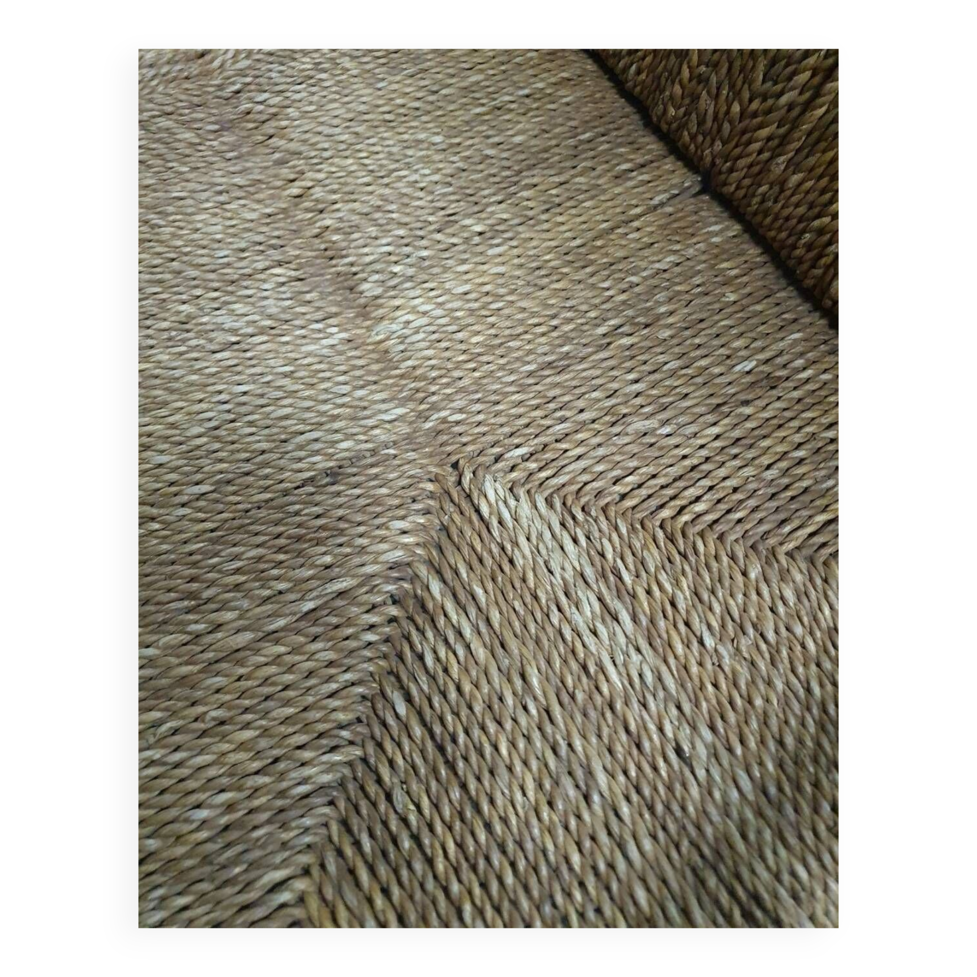 Vintage French papercord sofa with a metal frame base