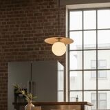 Industrial pendant light made of speckled enameled sheet metal and opaline