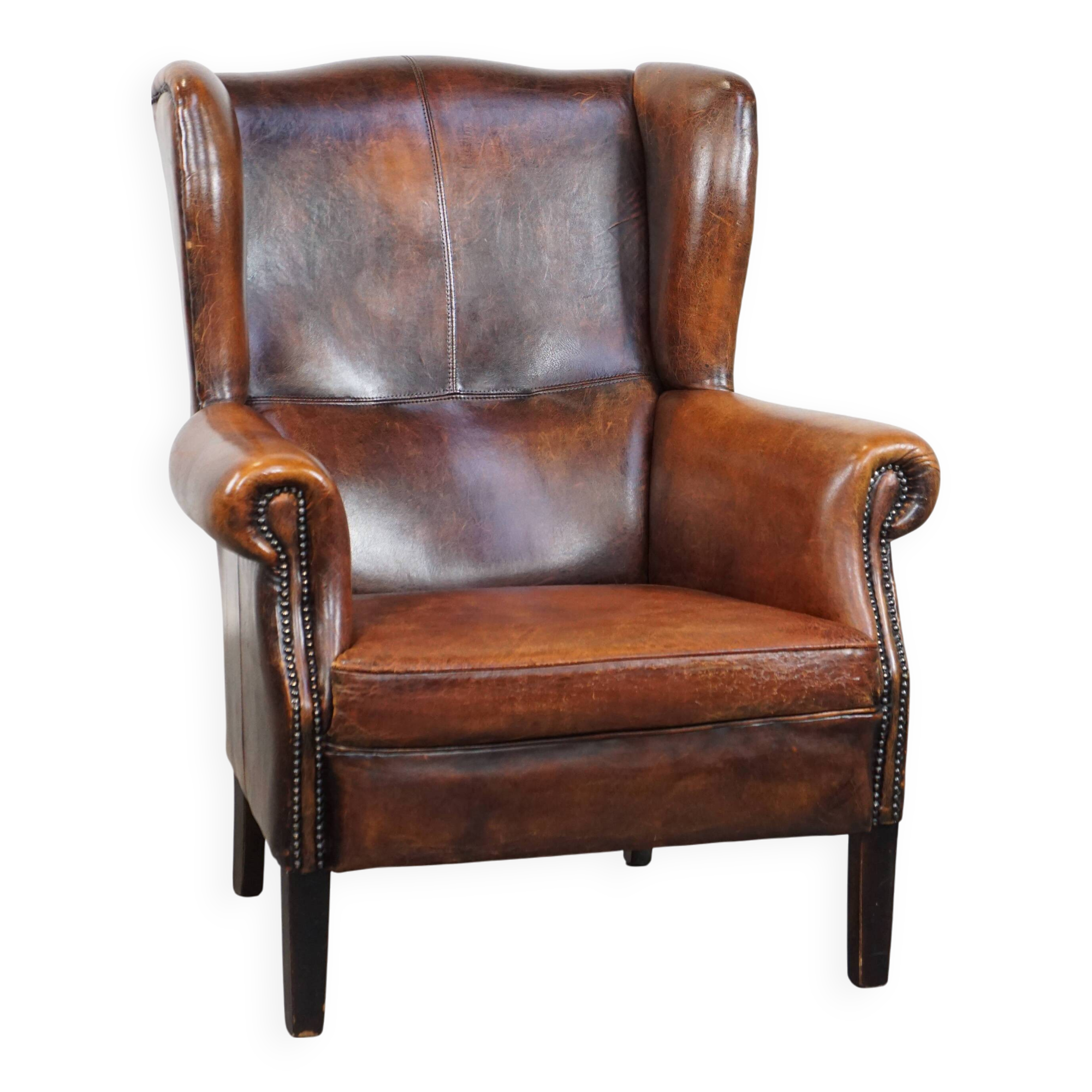 Vintage sheep leather wingback chair