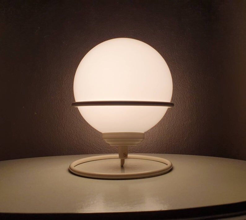 Vintage light bulb lamp on metal support 1980